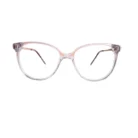 Gros plan sur des lunettes œil de chat transparentes, finition brillante, branches fines avec accent doré.