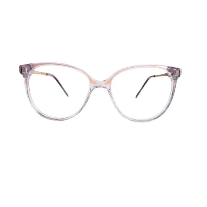 Gros plan sur des lunettes œil de chat transparentes, finition brillante, branches fines avec accent doré.