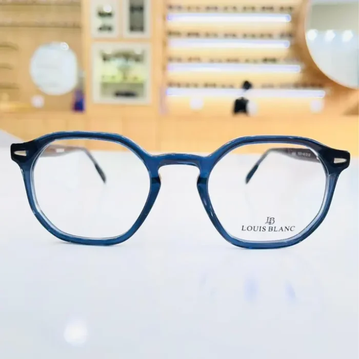 Vue de face de lunettes homme octogonales bleues en plastique brillant, branches fines, style classique élégant.