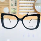 Vue de face de lunettes rectangulaires noires brillantes avec branches et accents dorés élégants.