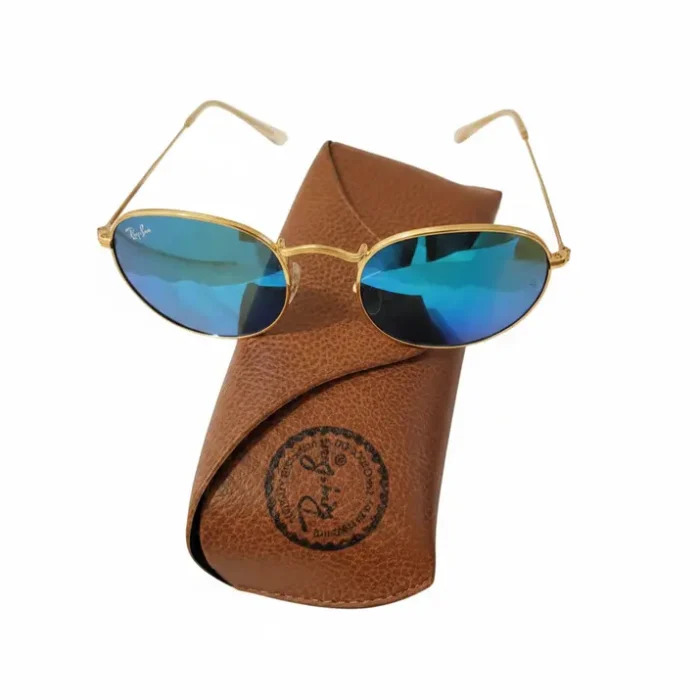 Avito lunette de soleil à monture métallique dorée avec verres ovales bleus réfléchissants, posée sur un étui marron.