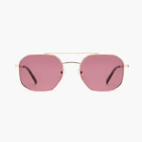 Comment choisir ses lunettes de soleil : paire à monture métal doré, pont double et verres roses octogonaux.