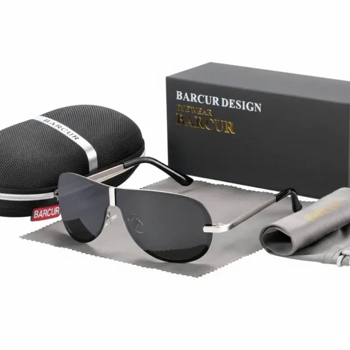 Lunette de soleil de luxe homme monture métal Lunette de soleil de luxe homme à monture métallique fine et verres foncés, avec étui rigide et chiffon de nettoyage.