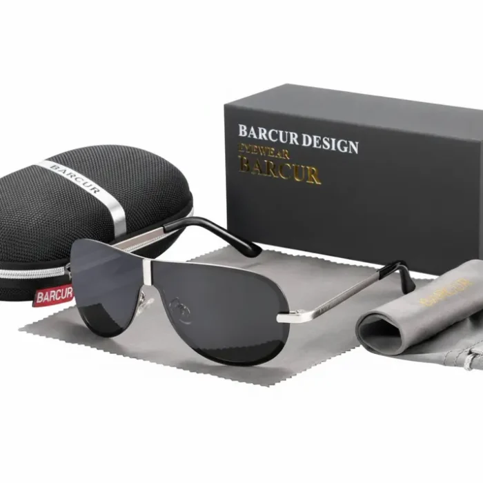 Lunette de soleil homme de luxe avec étui et chiffon Lunette de soleil homme de luxe à verres sombres, monture métal fine, avec étui zippé et chiffon de nettoyage gris.