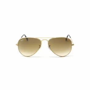 Ray Ban lunette de soleil aviator à monture métallique dorée, verres bruns dégradés et branches fines avec embouts noirs.