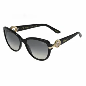 Chopard lunette de soleil noire forme papillon, verres dégradés foncé à clair et détails dorés sur les branches.