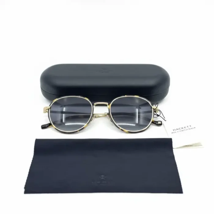 Hackett lunettes de soleil à verres ronds en métal, avec étui rigide sombre, chiffon de nettoyage et étiquette Hackett.