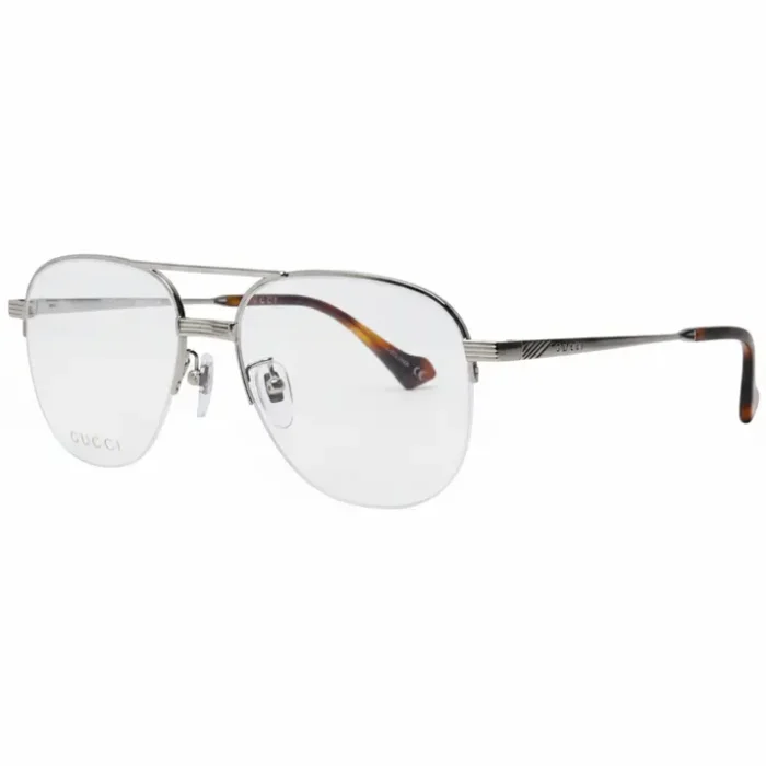 Lunette de soleil Gucci homme monture métal argenté Lunette de soleil Gucci homme en métal argenté, branches fines avec embouts marron, verres clairs et plaquettes nasales ajustables.