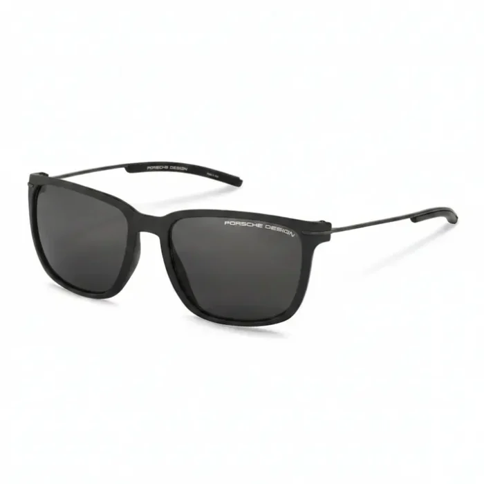 Lunette de soleil Porsche rectangulaire noire Lunette de soleil Porsche rectangulaire noire, verres fumés foncés et logo Porsche Design sur la monture.