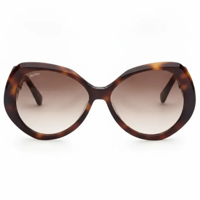 Lunette de soleil femme maroc écaille ronde Lunette de soleil femme maroc ronde oversize, monture épaisse écaille brun foncé et verres dégradés du sombre au clair.