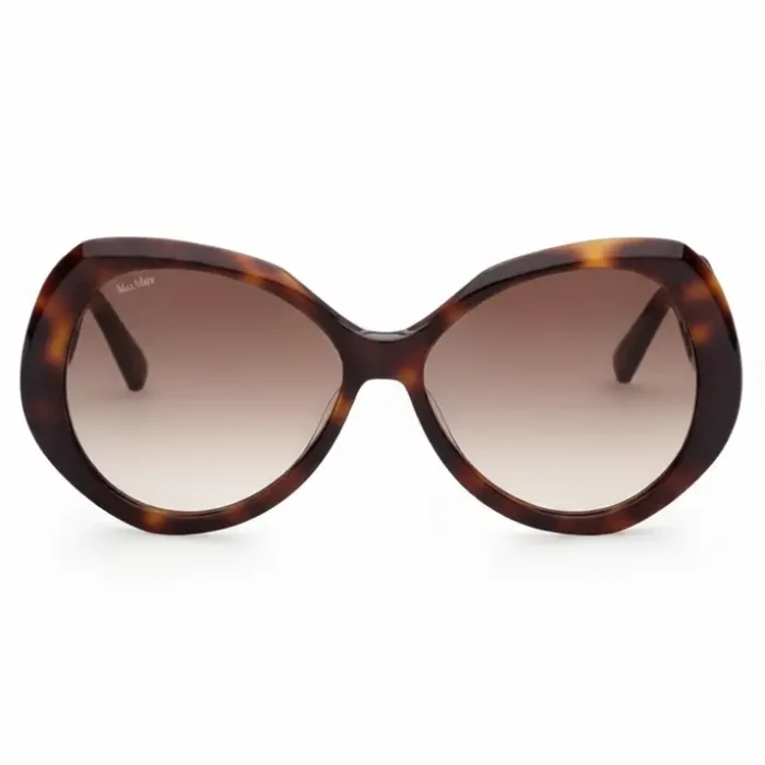 Lunette de soleil femme marron à monture ronde marbrée, verres ovales dégradés du brun foncé au clair.