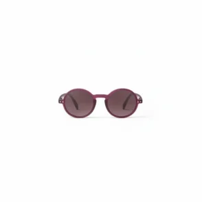 Lunette de soleil rouge ronde avec monture rouge unie, branches assorties et verres foncés protecteurs.