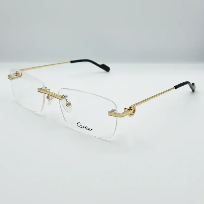 Lunette de vue homme Cartier sans monture, verres rectangulaires, charnières dorées, plaquettes transparentes et branches fines.