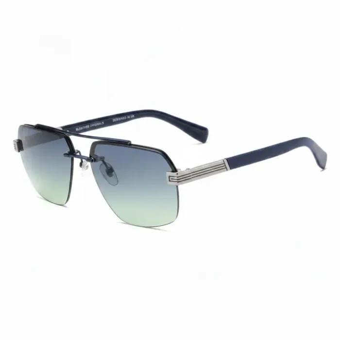 Lunettes de soleil Paris rectangulaires dégradé Lunettes de soleil Paris rectangulaires à verres dégradés bleu-vert, monture métallique fine, branches bleu foncé et détails argentés.