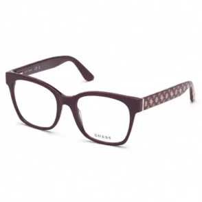 Lunettes de vue Guess rectangulaires violet foncé avec verres clairs, logo sur le verre et branches à motif doré.