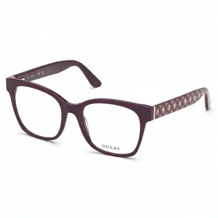Lunettes de vue Guess rectangulaires violet foncé Lunettes de vue Guess rectangulaires violet foncé avec verres clairs, logo sur le verre et branches à motif doré.